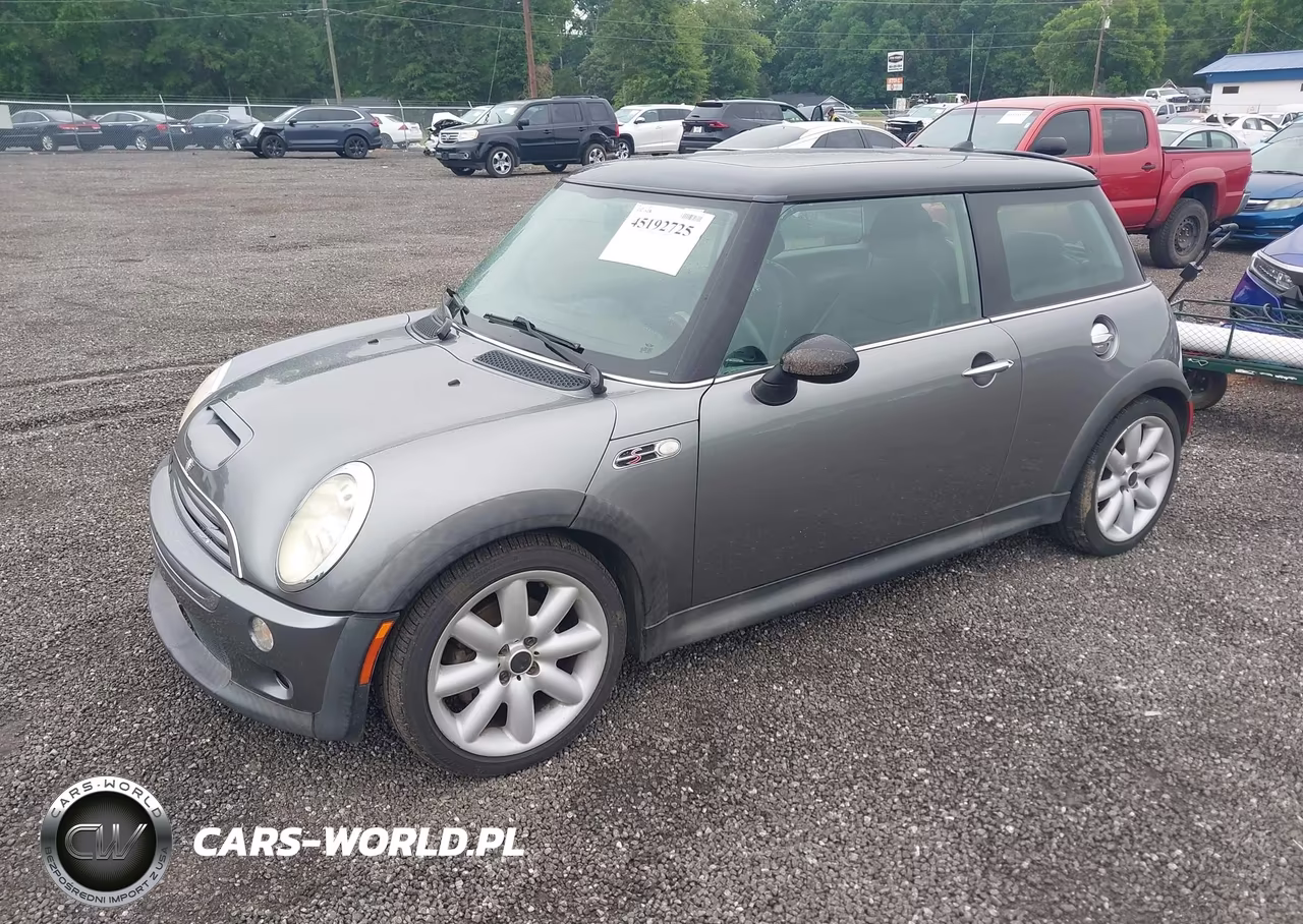 2006 Mini Cooper S VIN:WMWRE33506TL24037 - 2