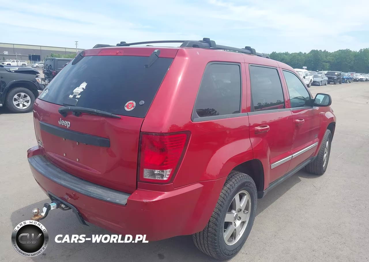 2009 Jeep Grand Cherokee Laredo VIN:1J8GR48K29C552220 - 4