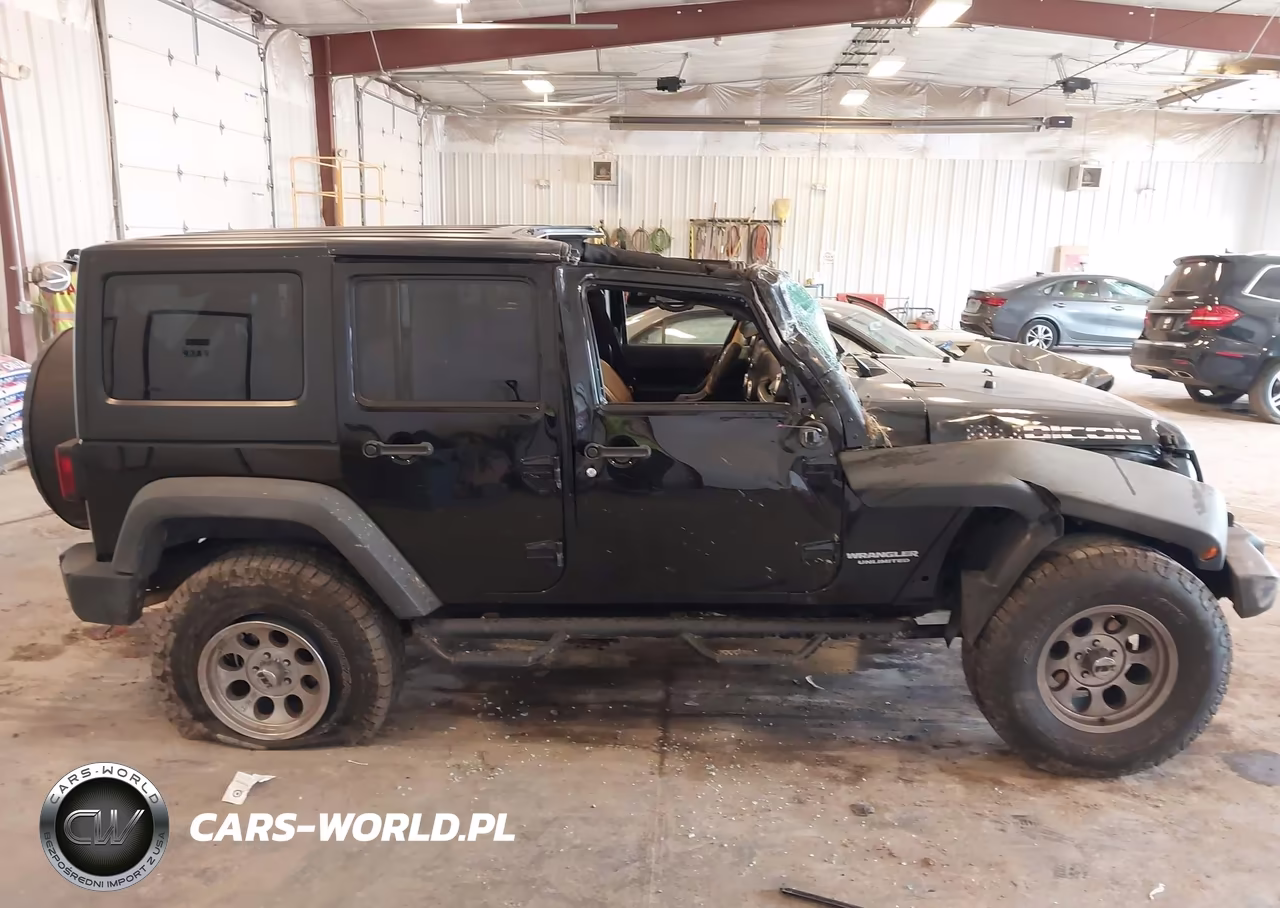 2011 Jeep Wrangler Unlimited Rubicon VIN:1J4BA6H14BL633733 - 13