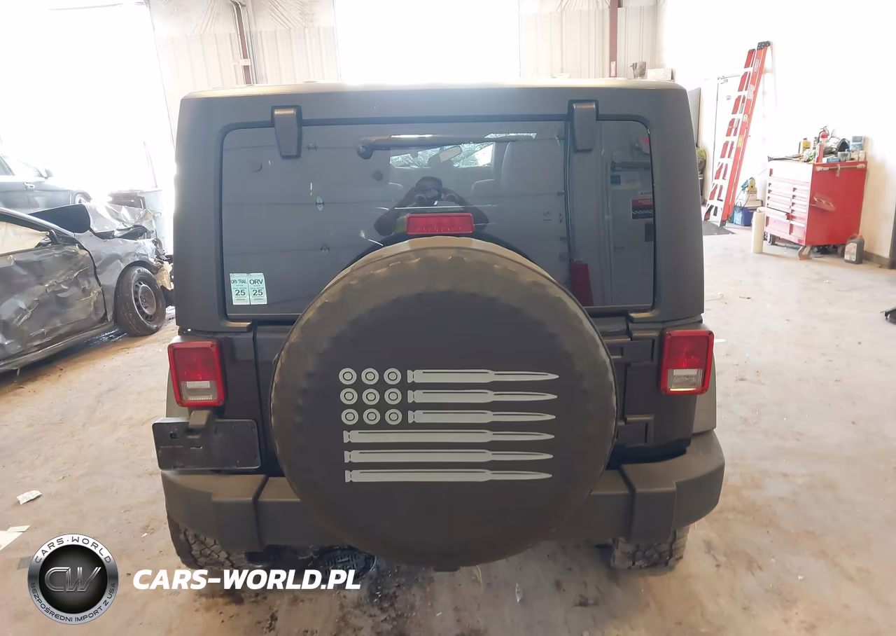 2011 Jeep Wrangler Unlimited Rubicon VIN:1J4BA6H14BL633733 - 16