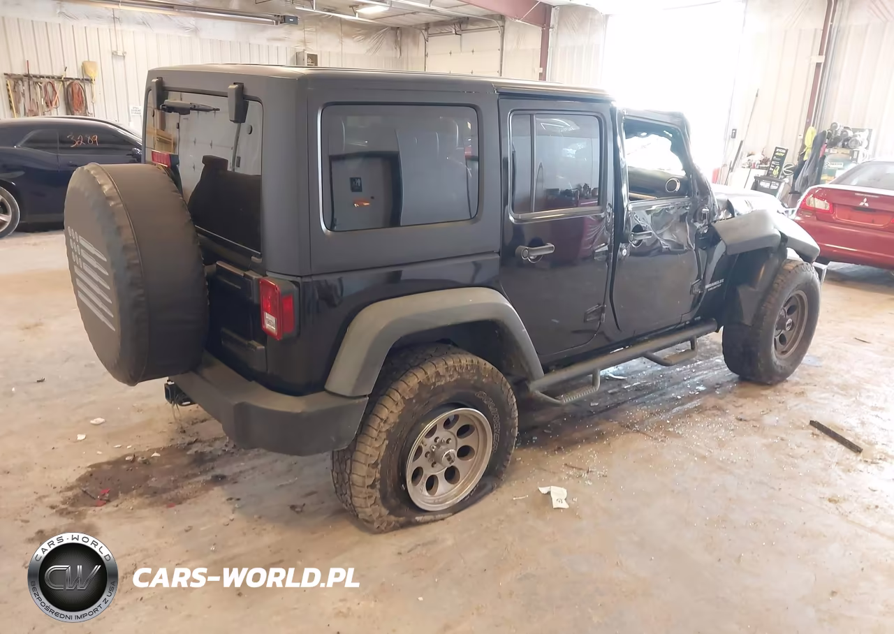 2011 Jeep Wrangler Unlimited Rubicon VIN:1J4BA6H14BL633733 - 4