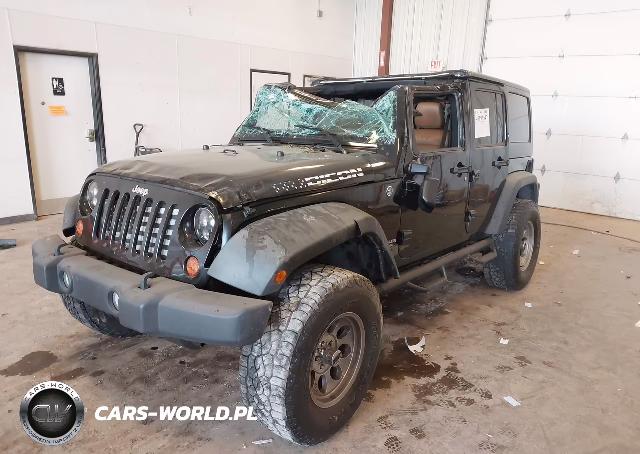 2011 Jeep Wrangler Unlimited Rubicon VIN:1J4BA6H14BL633733 - 6