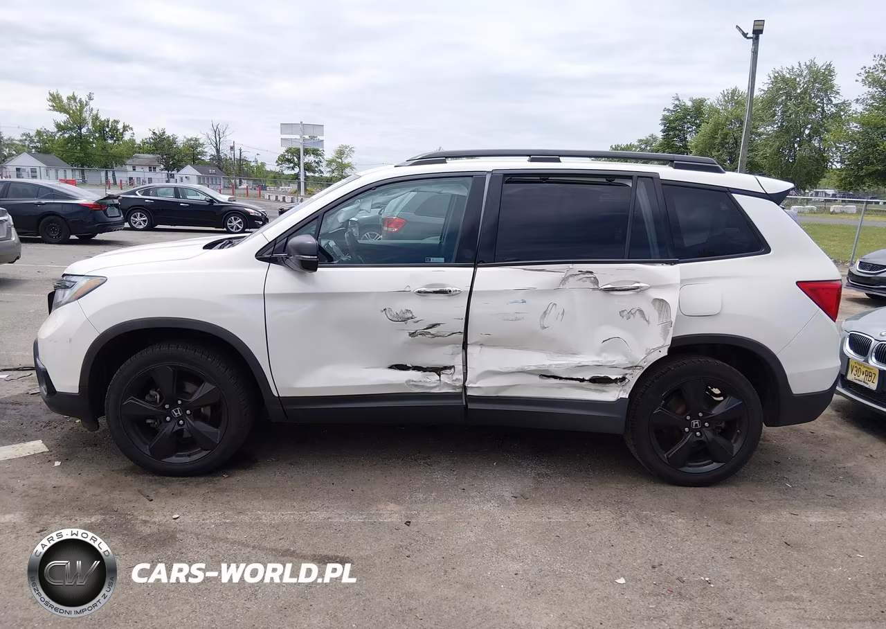 2019 Honda Passport Elite VIN:5FNYF8H06KB004806 - 6