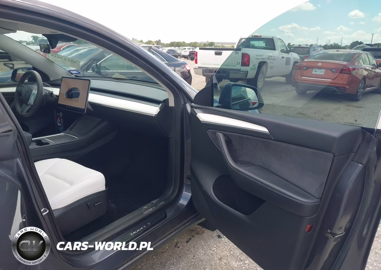 2023 Tesla Model Y Performance Dual Motor All-Wheel Drive VIN:7SAYGDEF4PF838761 - 5