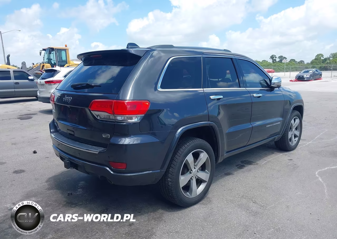 2014 Jeep Grand Cherokee Overland VIN:1C4RJFCM5EC413494 - 4