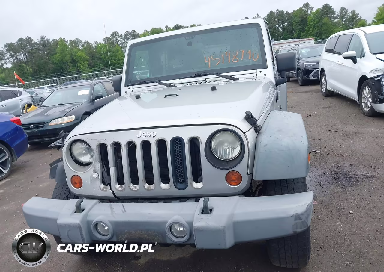 2012 Jeep Wrangler Unlimited Sport VIN:1C4BJWDGXCL172619 - 12