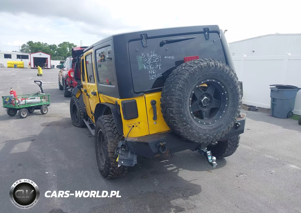 2015 Jeep Wrangler Unlimited Sport VIN:1C4BJWDGXFL609412 - 3