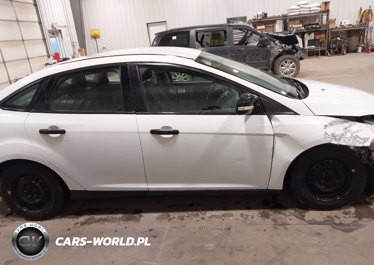 2016 Ford Focus S VIN:1FADP3E2XGL264575 - 13