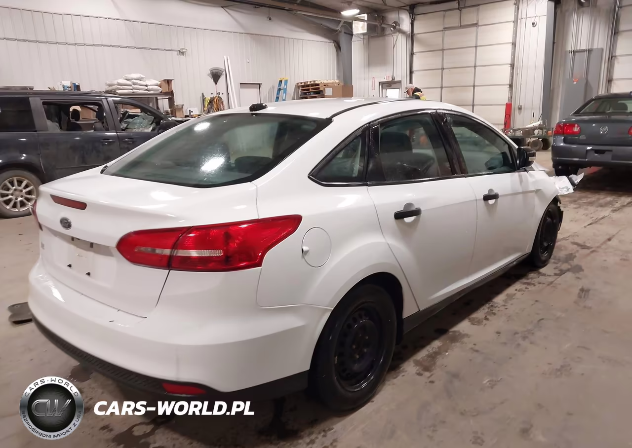 2016 Ford Focus S VIN:1FADP3E2XGL264575 - 4