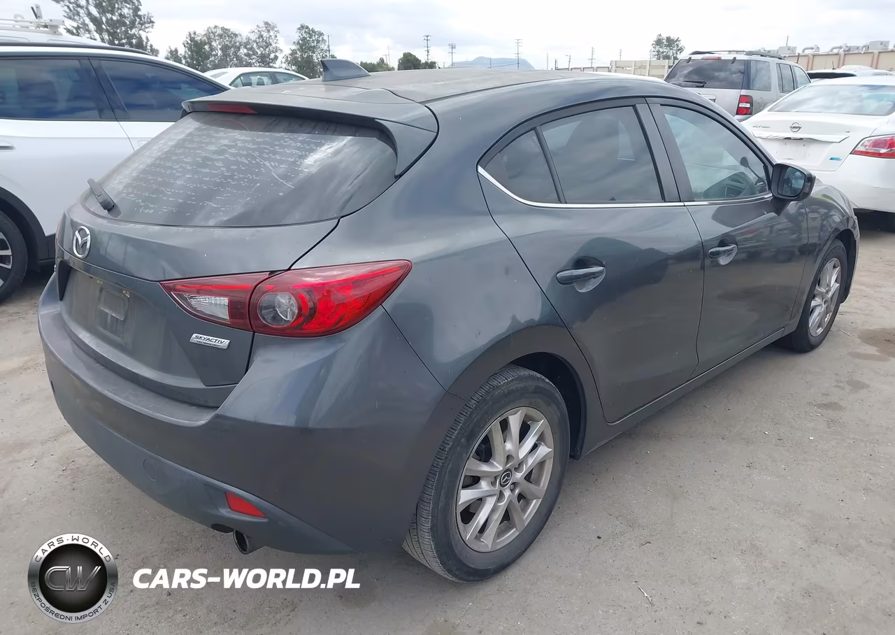 2014 Mazda Mazda3 I Touring VIN:JM1BM1L75E1180573 - 4