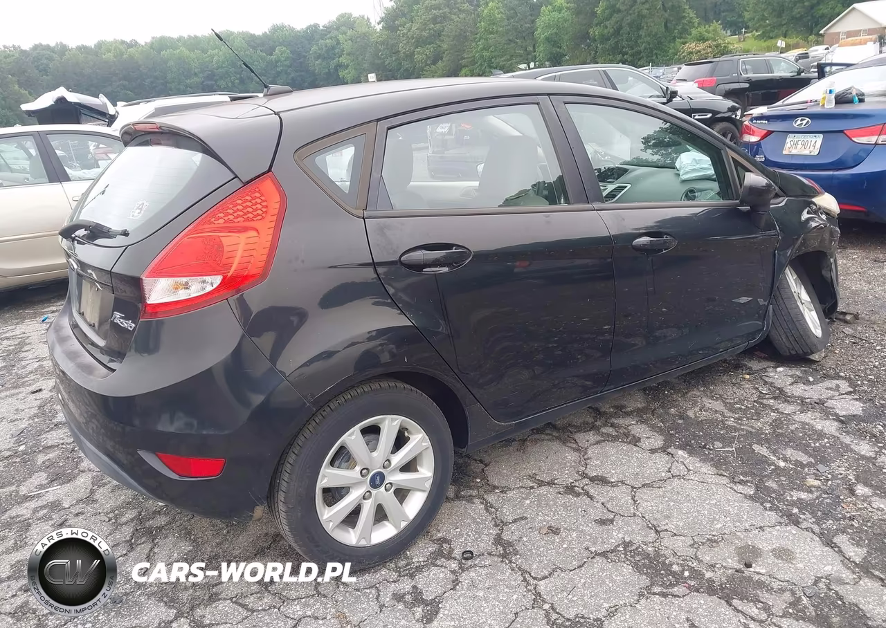 2011 Ford Fiesta Se VIN:3FADP4EJXBM174315 - 4