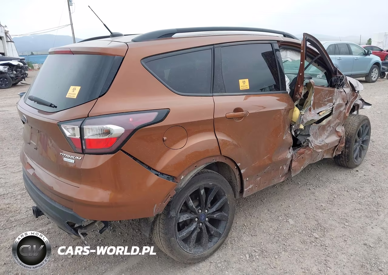 2017 Ford Escape Titanium VIN:1FMCU0J93HUC26662 - 4
