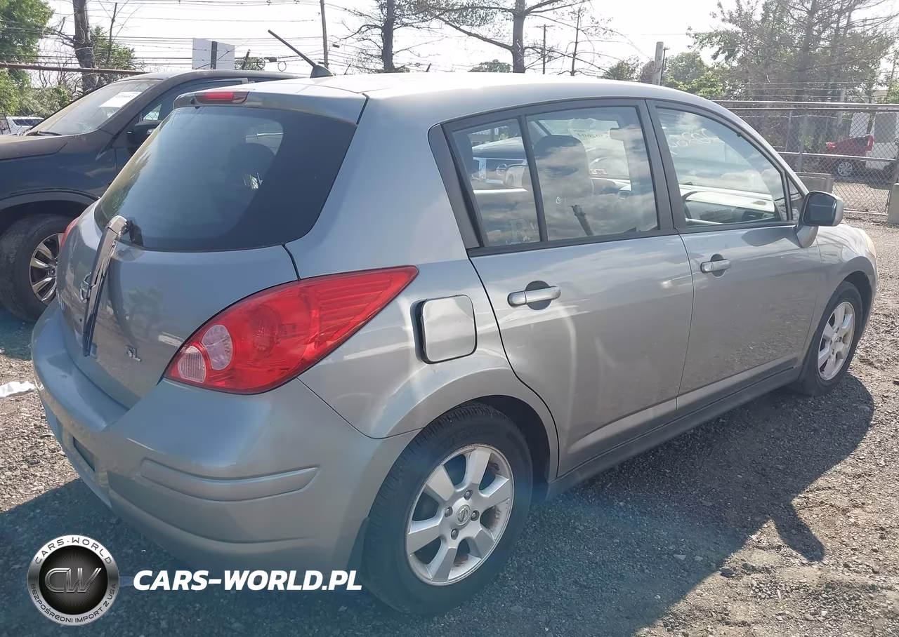 2009 Nissan Versa 1.8Sl VIN:3N1BC13E59L405058 - 12