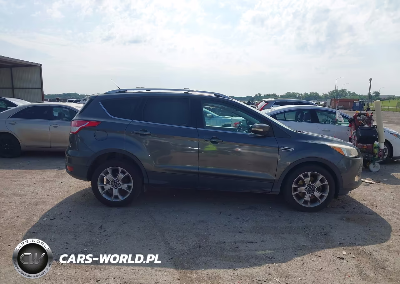 2015 Ford Escape Titanium VIN:1FMCU0J92FUB71327 - 13