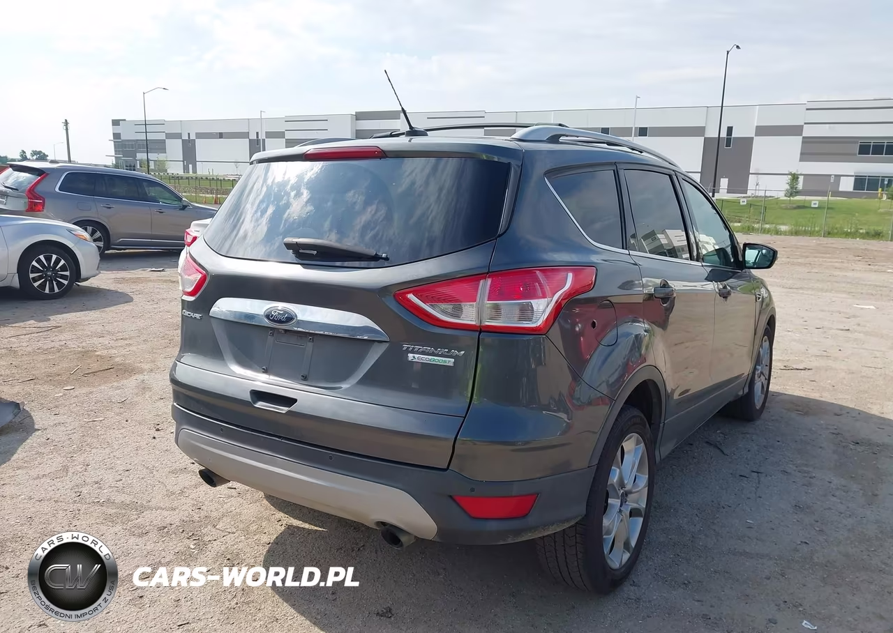 2015 Ford Escape Titanium VIN:1FMCU0J92FUB71327 - 4