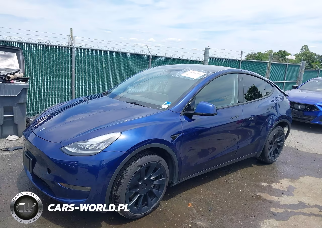 2023 Tesla Model Y Awd-Long Range Dual Motor All-Wheel Drive VIN:7SAYGDEE6PA062038 - 2