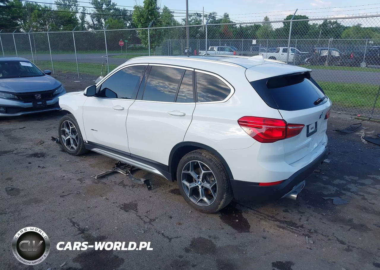 2018 BMW X1 xDrive28I VIN:WBXHT3C31J5K22202 - 3
