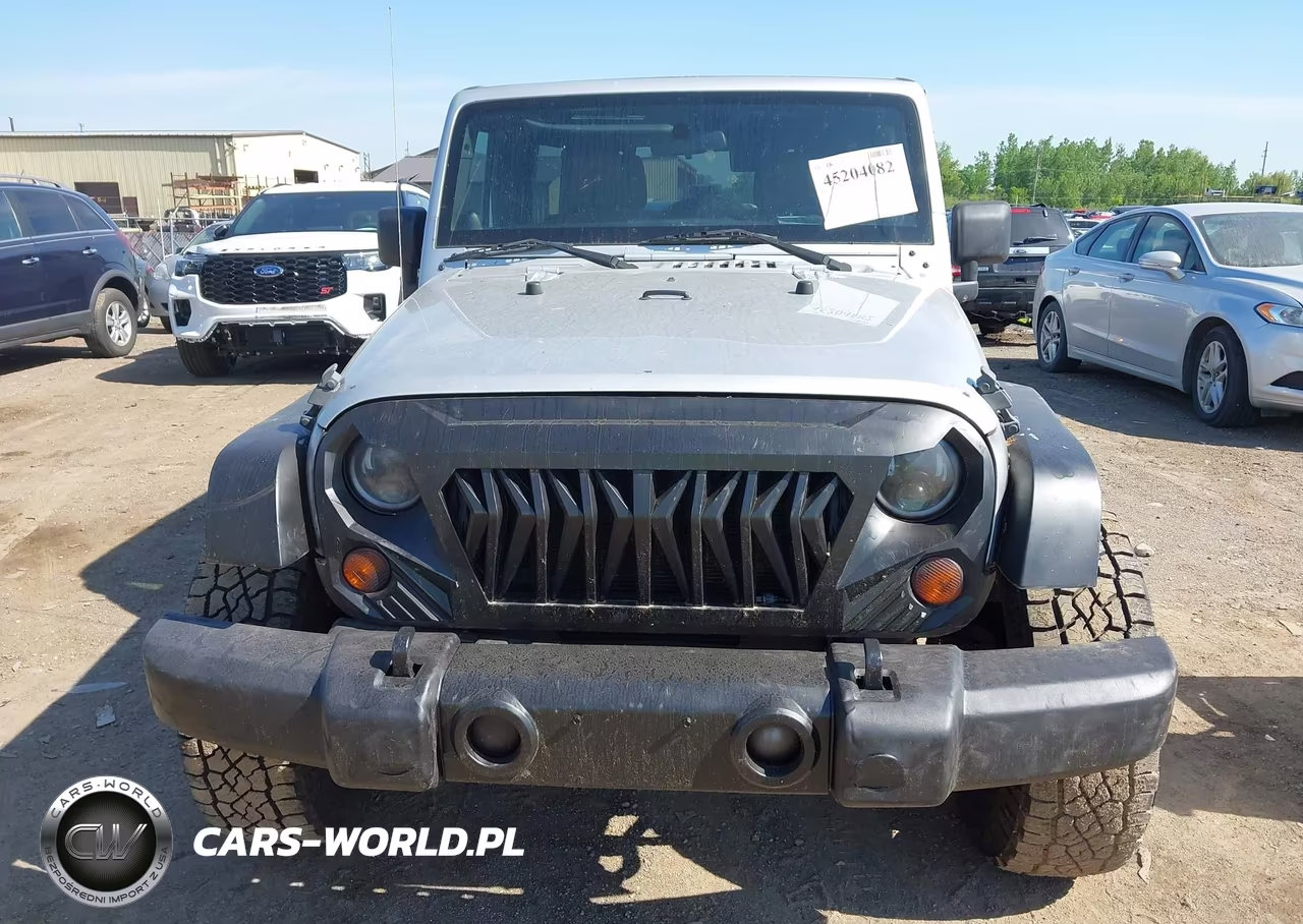 2011 Jeep Wrangler Unlimited Sahara VIN:1J4BA5H18BL635804 - 12