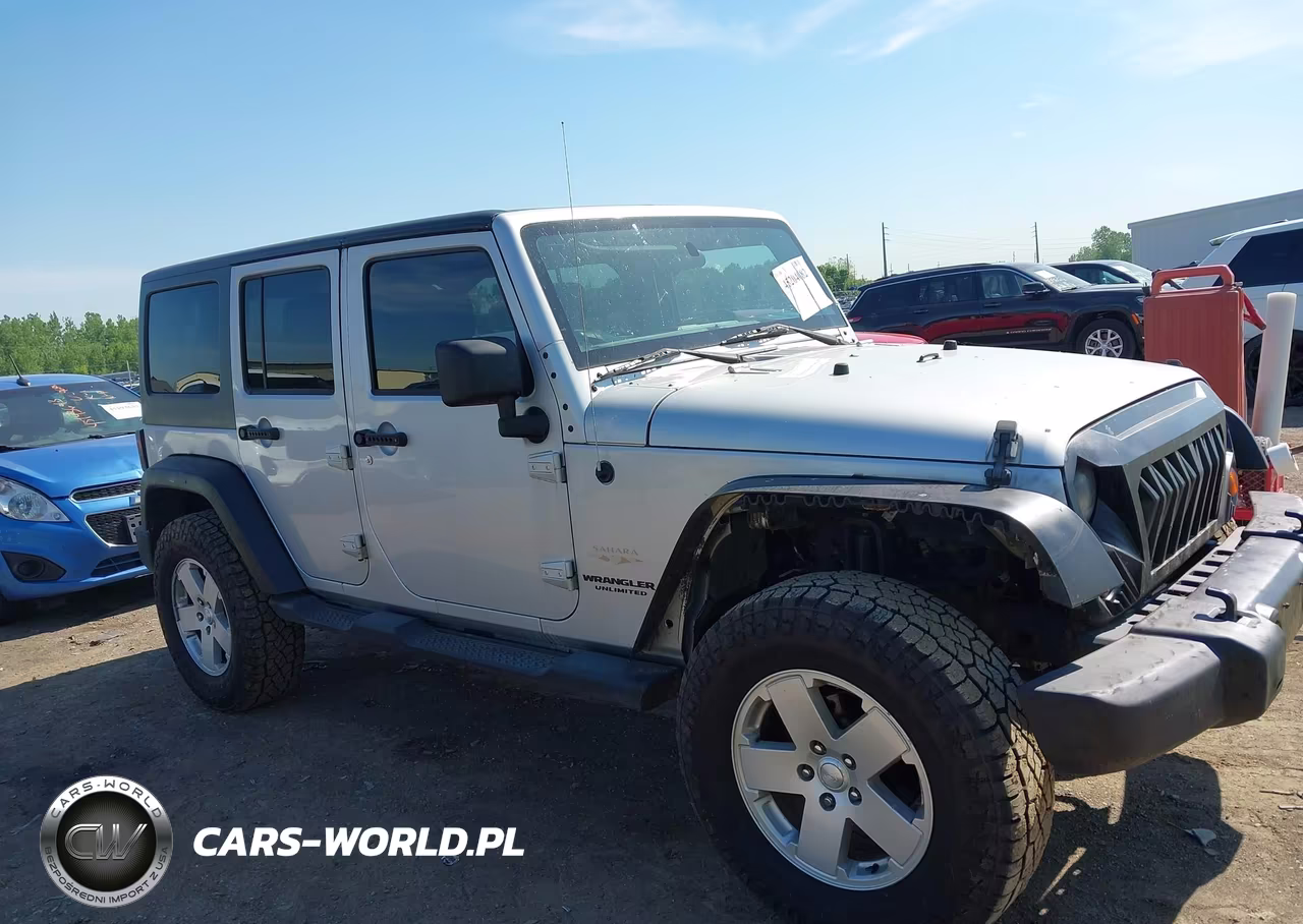 2011 Jeep Wrangler Unlimited Sahara VIN:1J4BA5H18BL635804 - 13