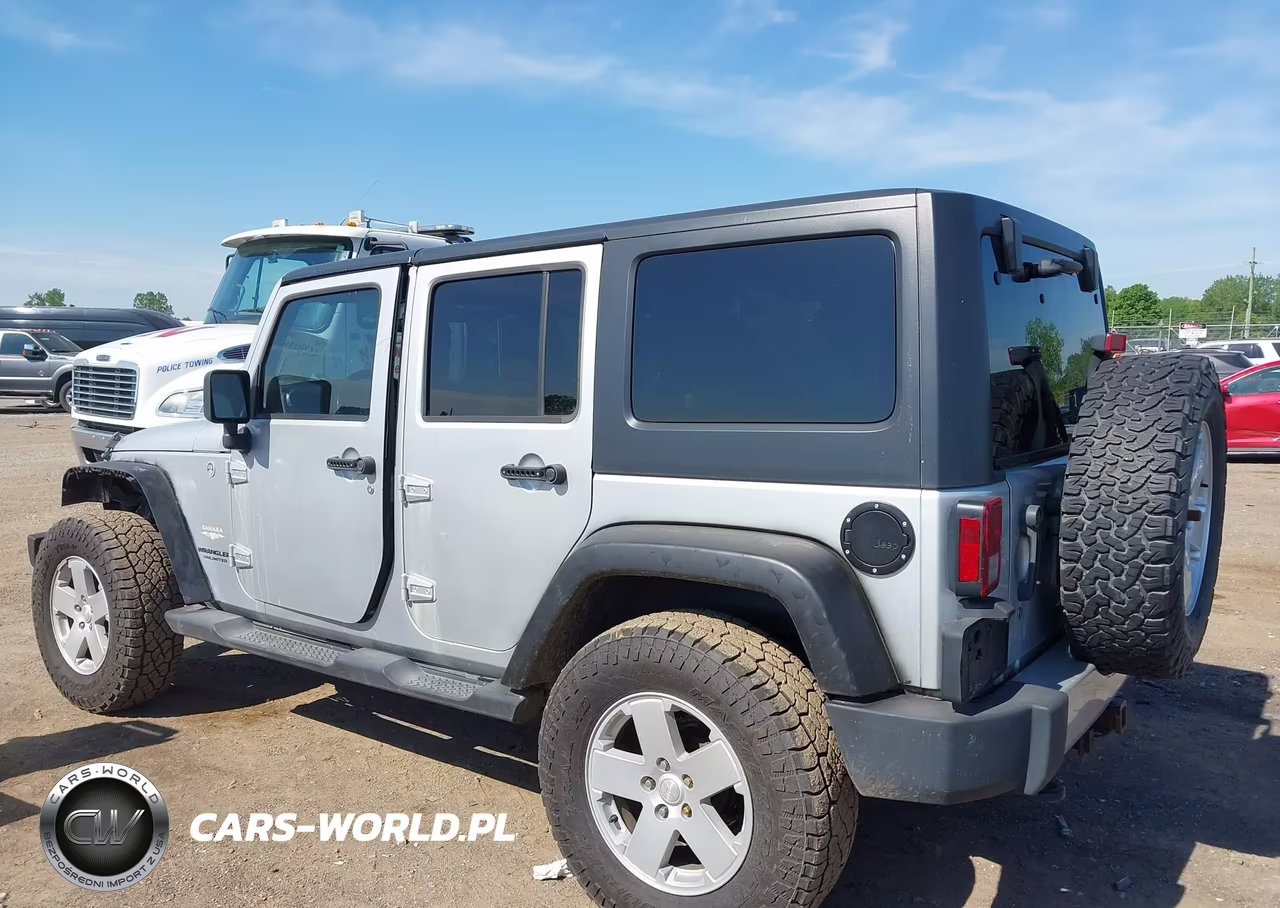 2011 Jeep Wrangler Unlimited Sahara VIN:1J4BA5H18BL635804 - 14