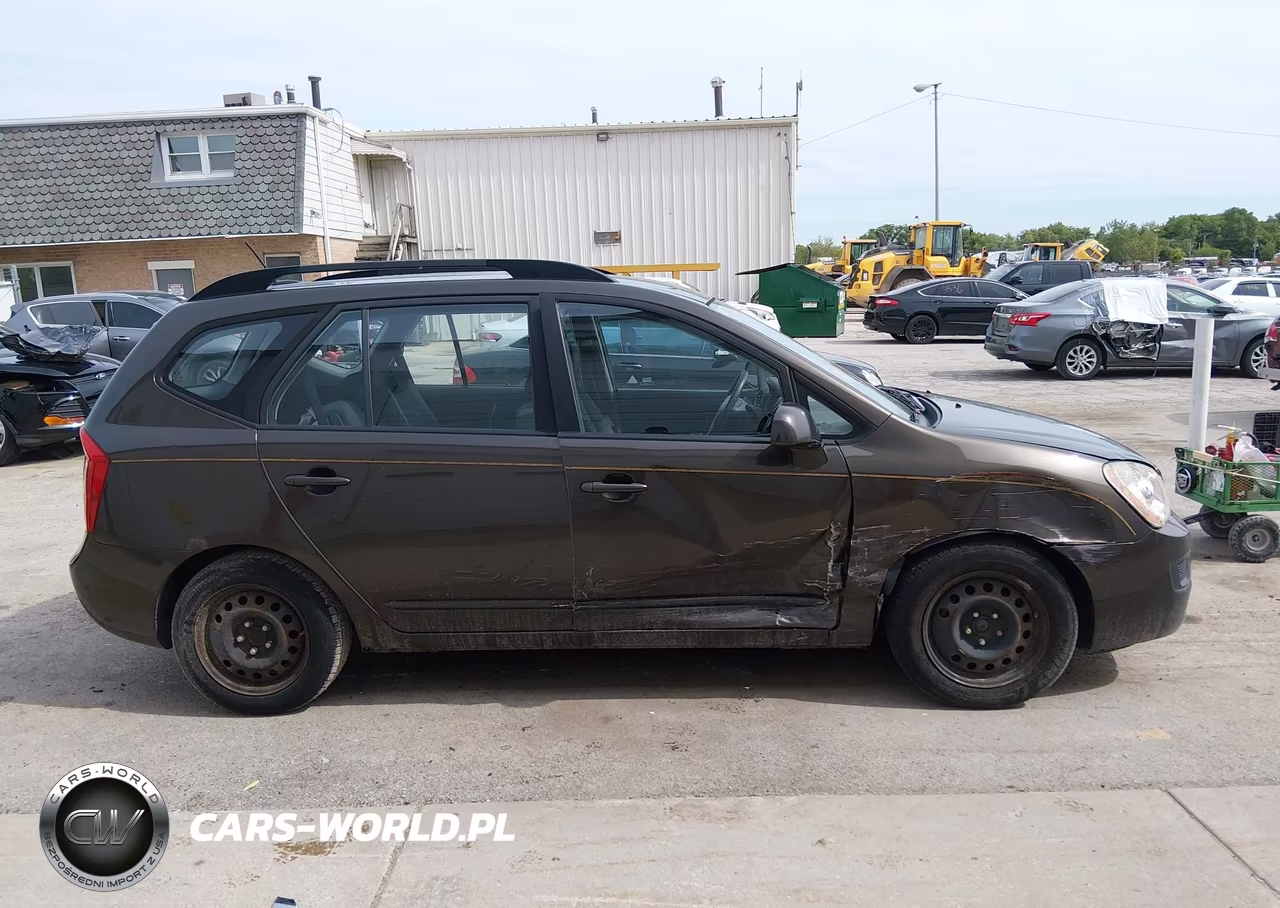 2009 Kia Rondo Lx VIN:KNAFG528197273102 - 14