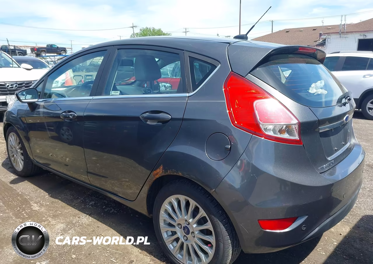 2016 Ford Fiesta Titanium VIN:3FADP4FJ5GM126579 - 12