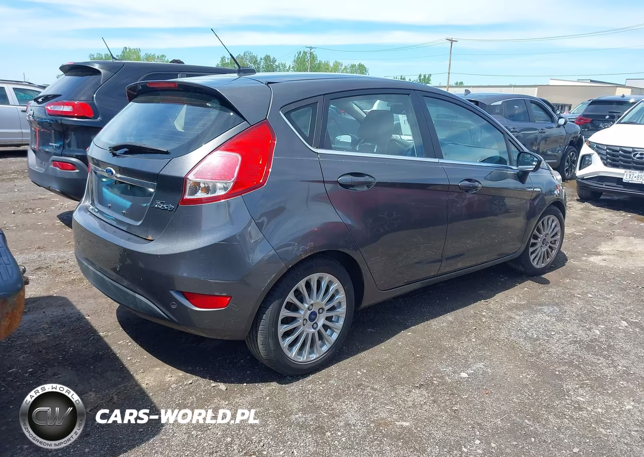 2016 Ford Fiesta Titanium VIN:3FADP4FJ5GM126579 - 4