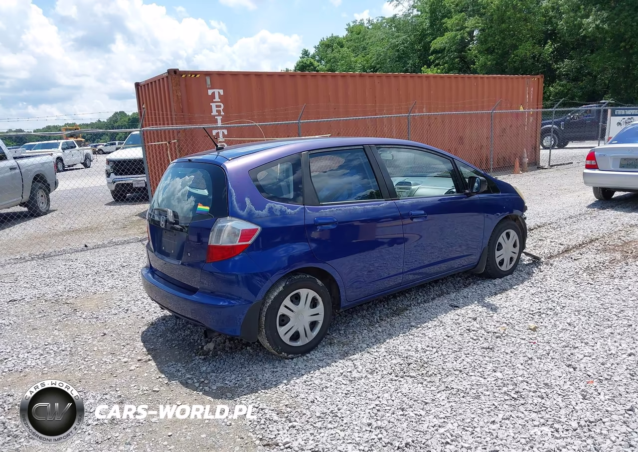 2009 Honda Fit VIN:JHMGE87229S039520 - 4