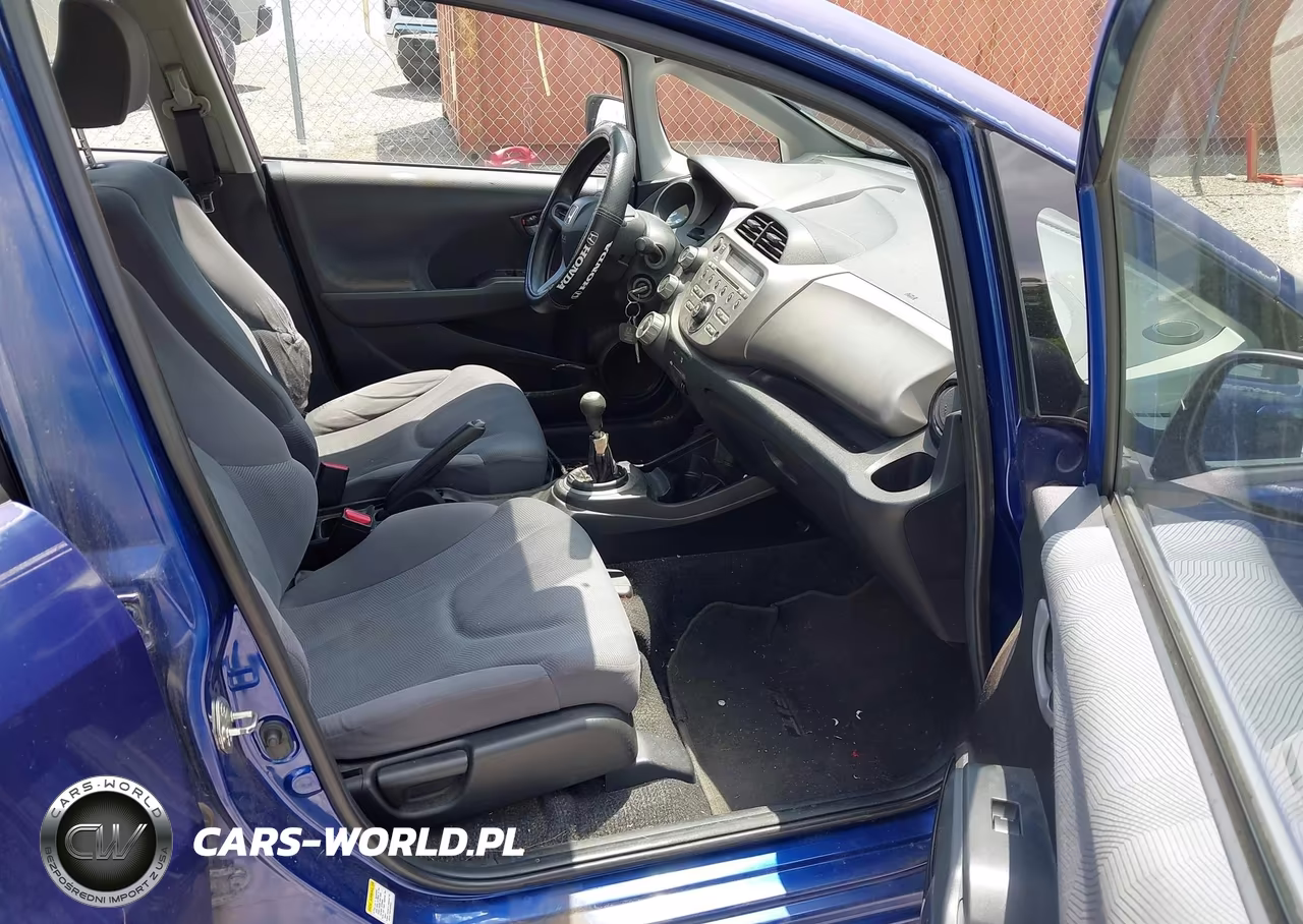 2009 Honda Fit VIN:JHMGE87229S039520 - 5