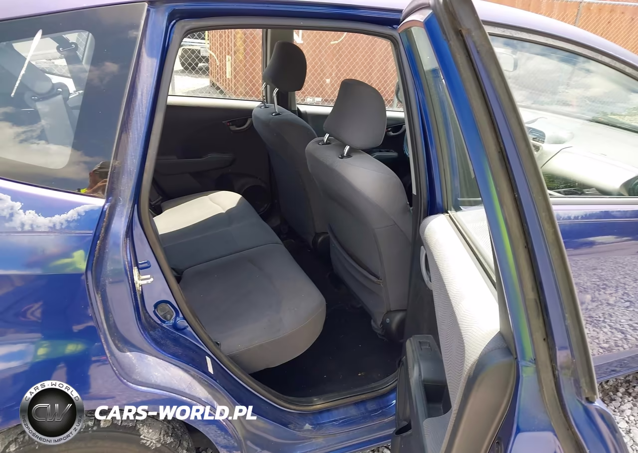 2009 Honda Fit VIN:JHMGE87229S039520 - 8