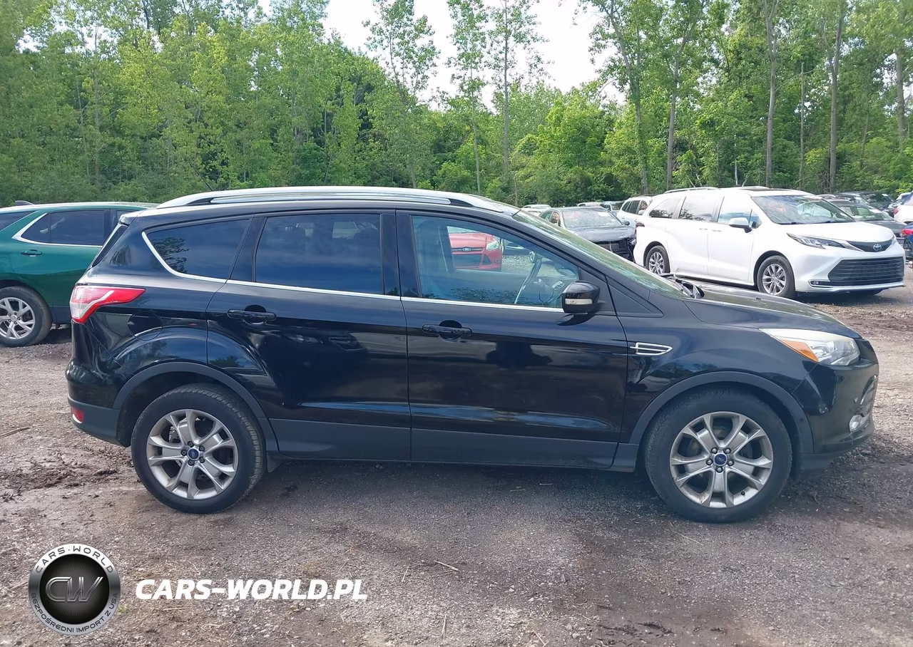 2016 Ford Escape Titanium VIN:1FMCU0JX4GUA20330 - 13