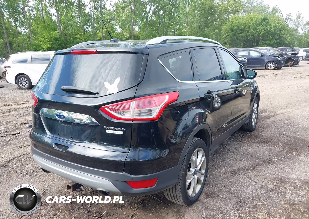 2016 Ford Escape Titanium VIN:1FMCU0JX4GUA20330 - 4