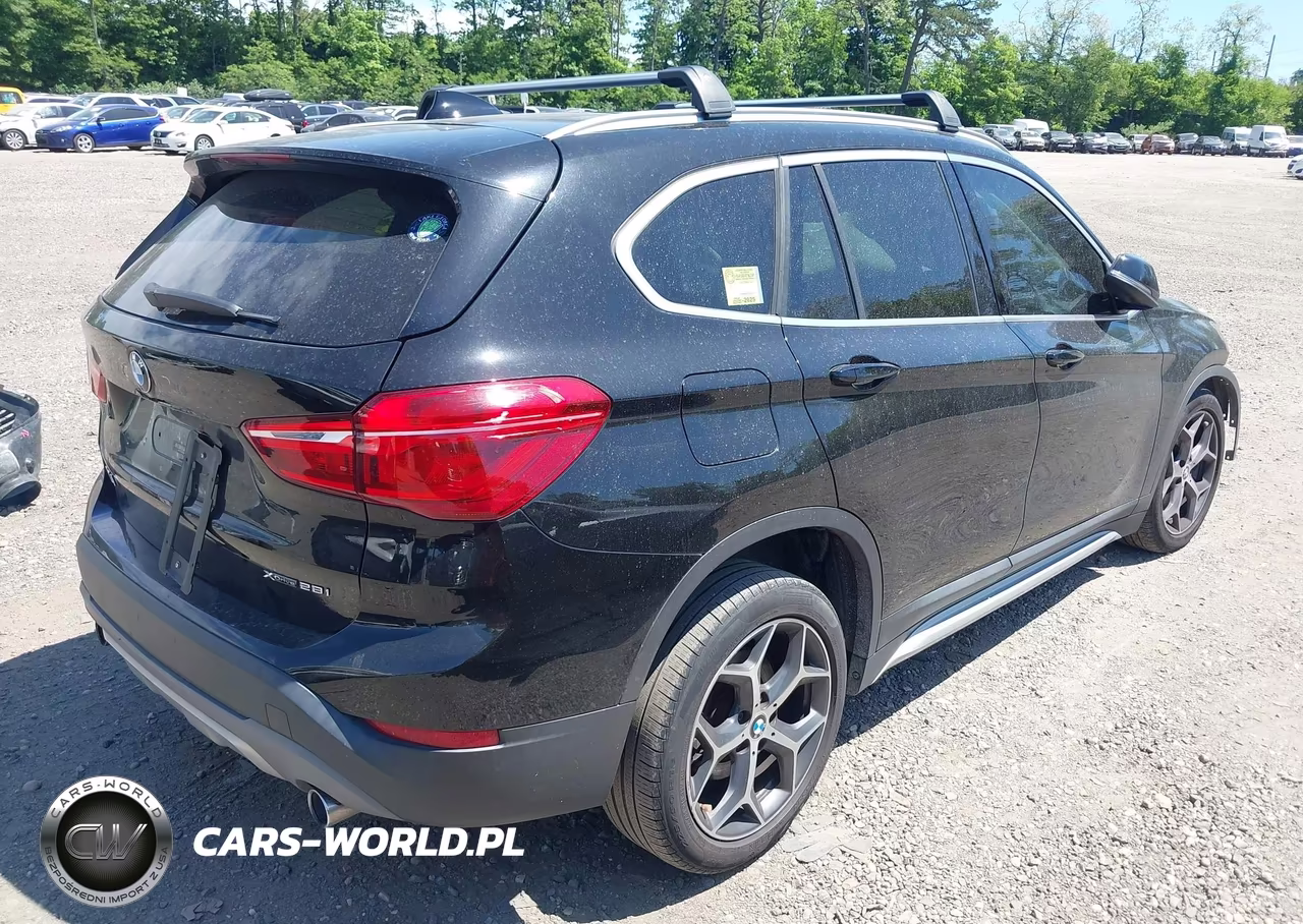 2018 BMW X1 xDrive28I VIN:WBXHT3C34J5L28806 - 4