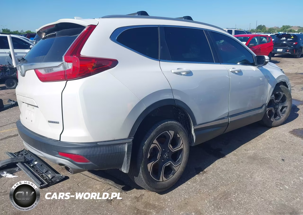 2019 Honda Cr-V Touring VIN:5J6RW1H99KL001562 - 4