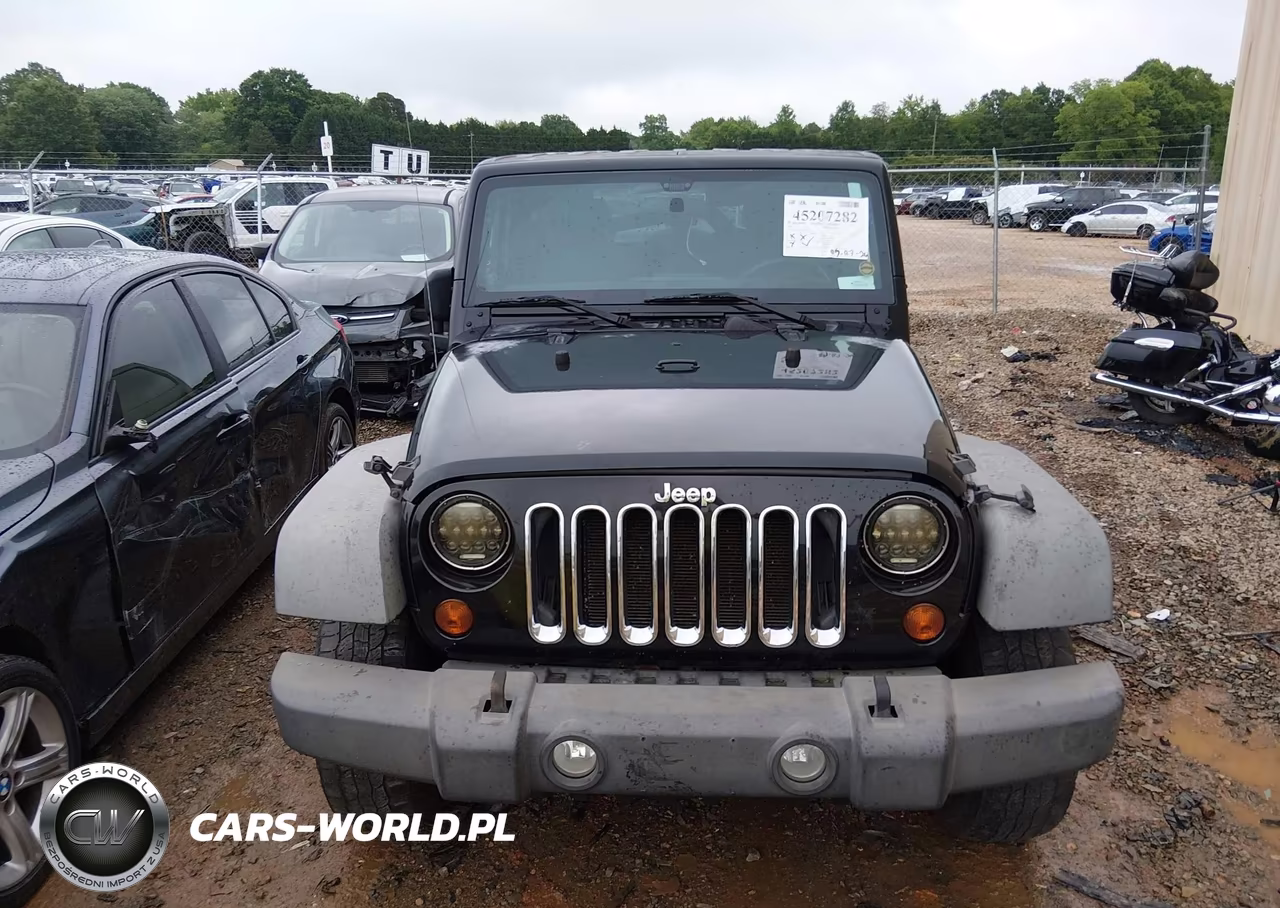 2011 Jeep Wrangler Sport VIN:1J4AA2D1XBL505300 - 12