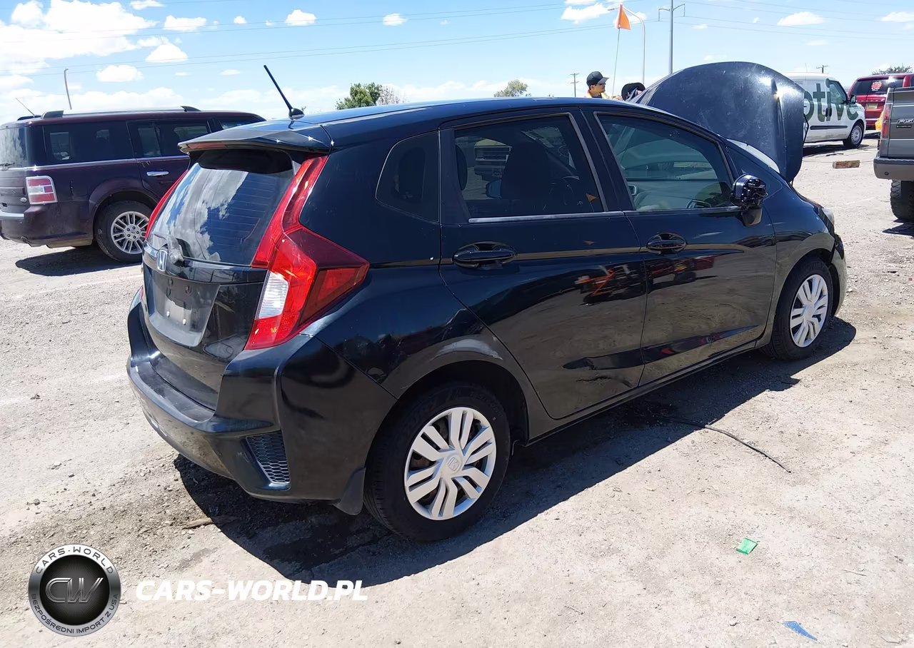 2015 Honda Fit Lx VIN:3HGGK5H52FM769029 - 4