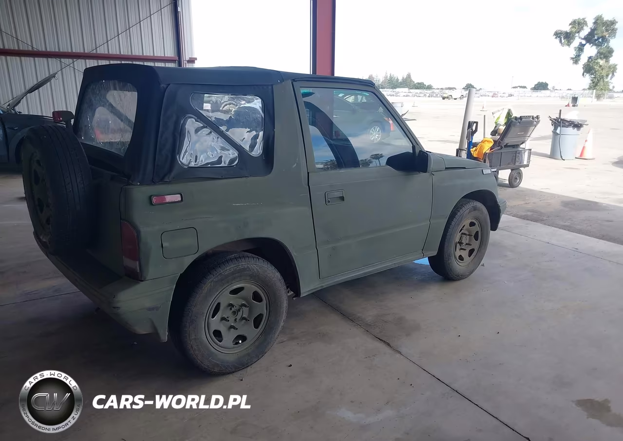 1995 Geo Tracker VIN:2CNBE1866S6904630 - 4