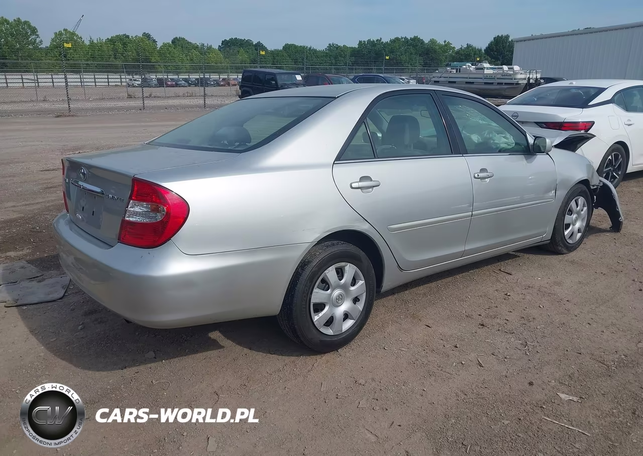 2002 Toyota Camry Le VIN:4T1BE32K12U631454 - 4