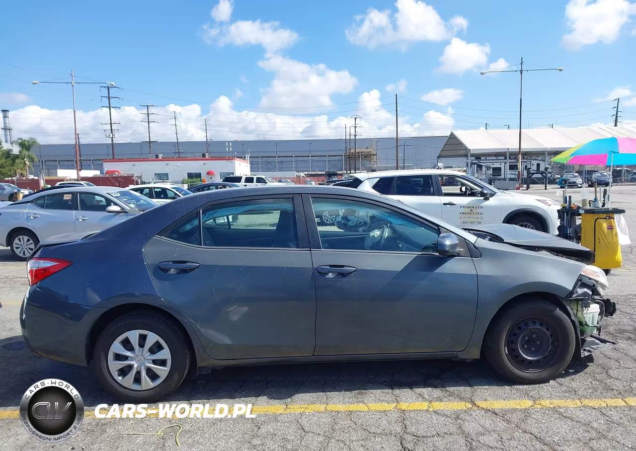 2015 Toyota Corolla L VIN:5YFBURHE6FP295136 - 14