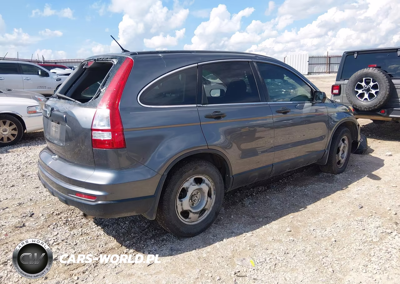 2011 Honda Cr-V Lx VIN:3CZRE3H30BG704975 - 4