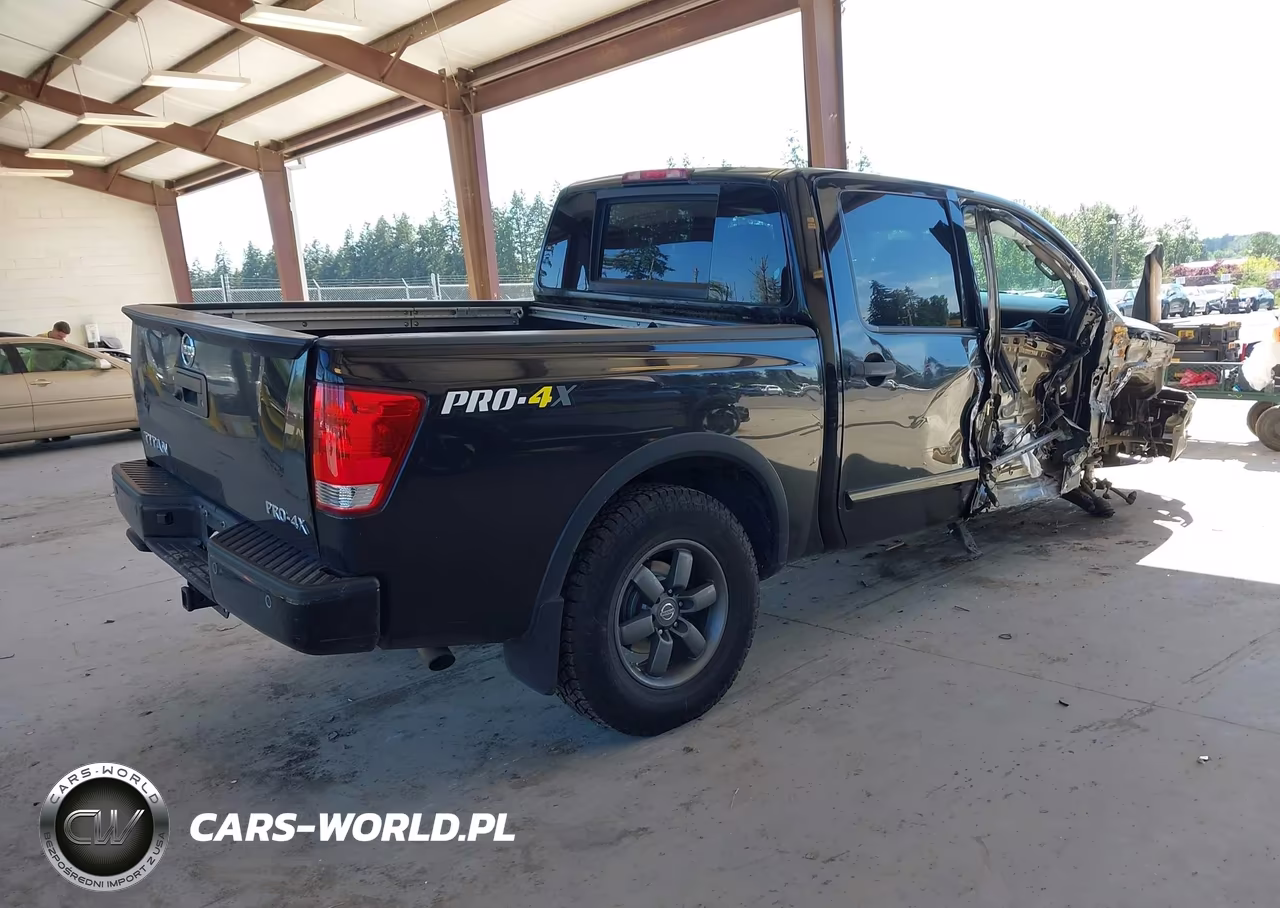 2014 Nissan Titan Pro-4X VIN:1N6AA0EC6EN519825 - 4