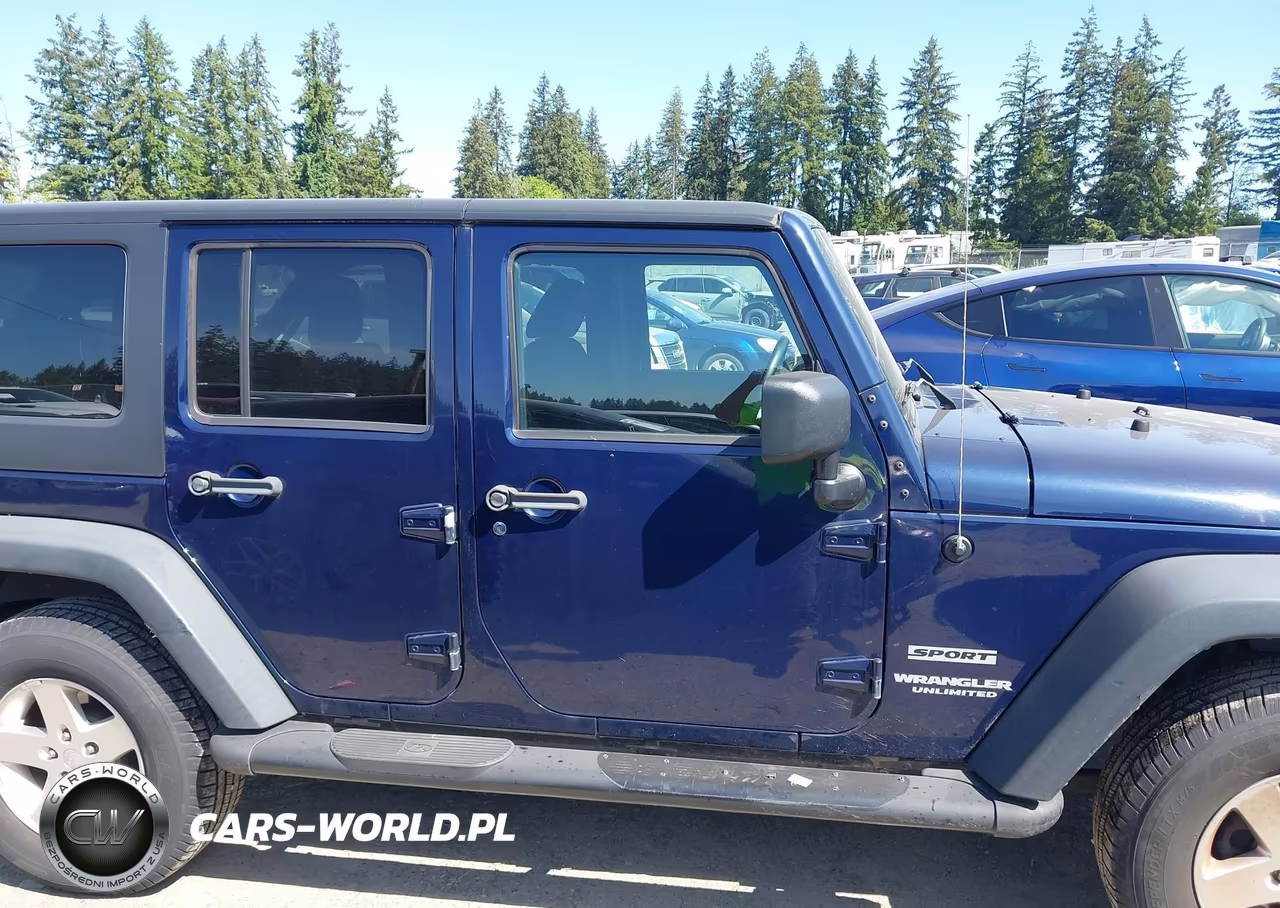 2013 Jeep Wrangler Unlimited Sport VIN:1C4HJWDG0DL623195 - 13