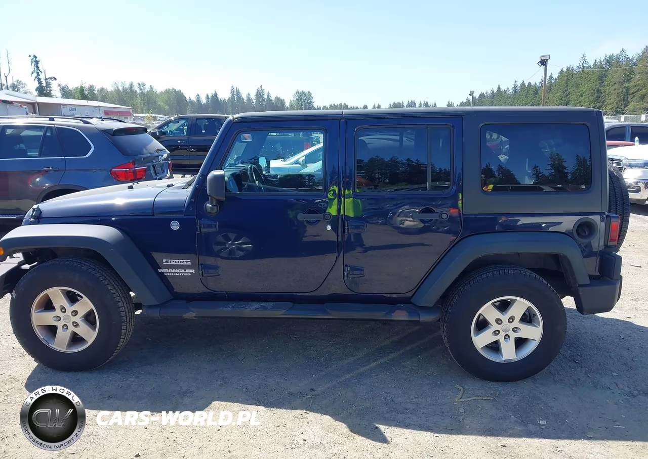 2013 Jeep Wrangler Unlimited Sport VIN:1C4HJWDG0DL623195 - 14