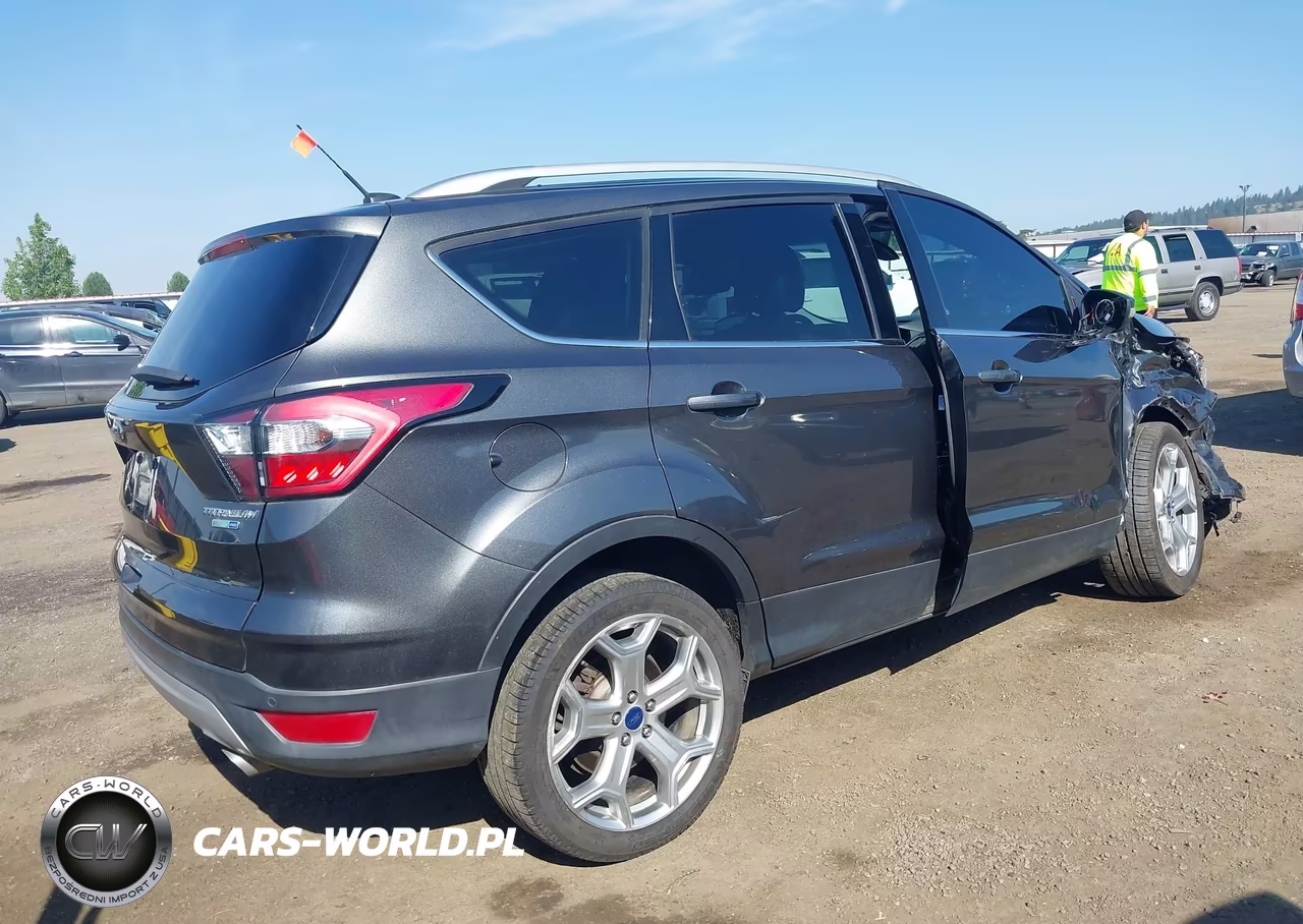 2017 Ford Escape Titanium VIN:1FMCU9JD4HUE55215 - 4