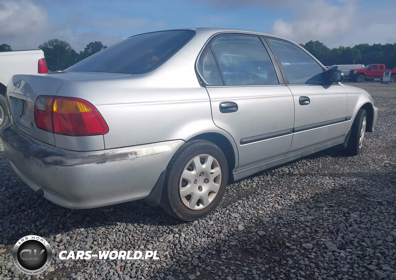1999 Honda Civic Lx VIN:1HGEJ6671XL040074 - 4