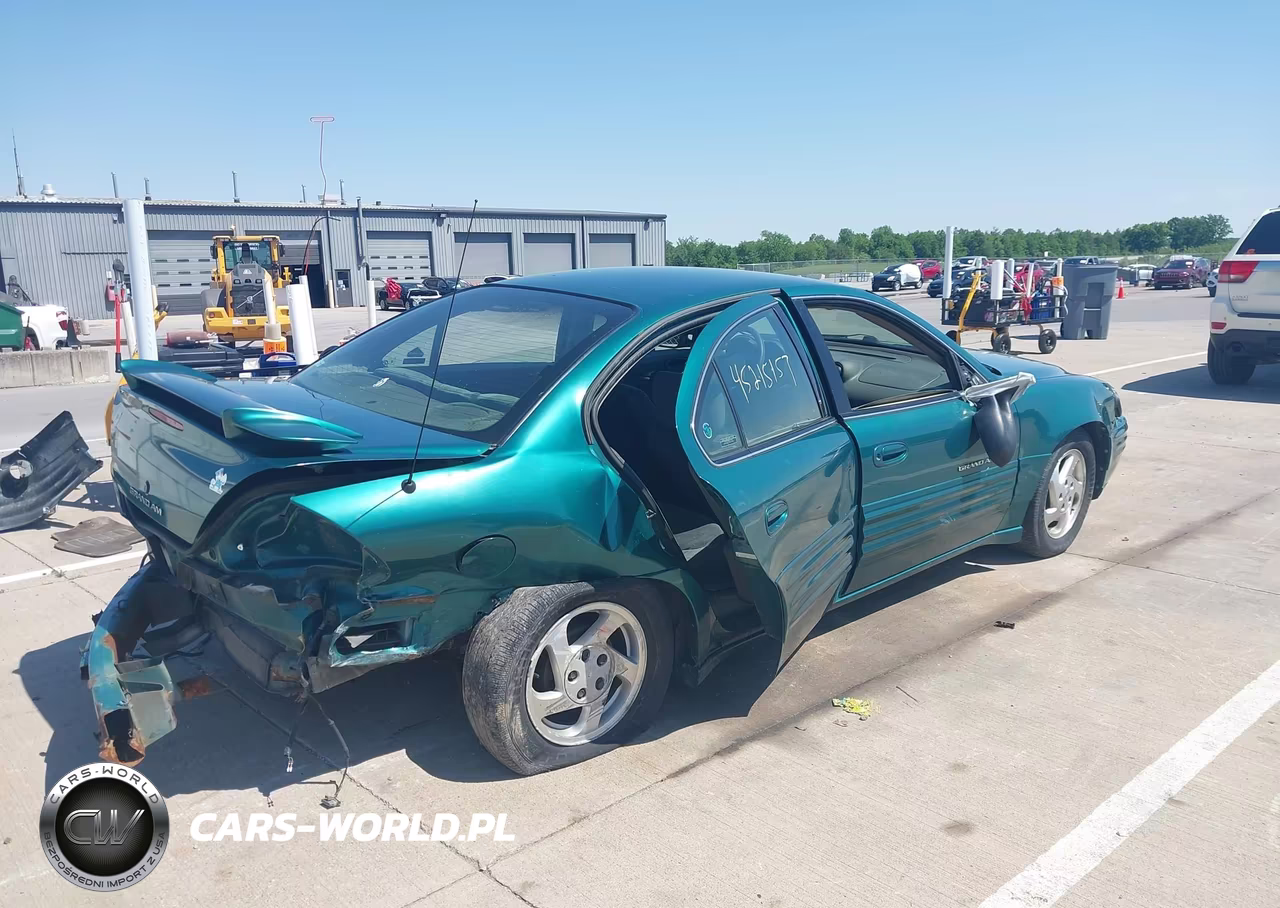 1999 Pontiac Grand Am Se1 VIN:1G2NE52E9XC511118 - 4