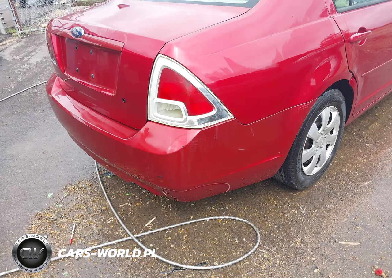 2009 Ford Fusion S VIN:3FAHP06Z39R212608 - 13