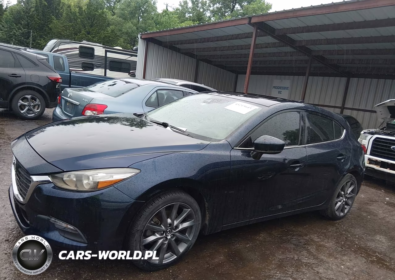 2018 Mazda Mazda3 Touring VIN:3MZBN1L30JM194336 - 14
