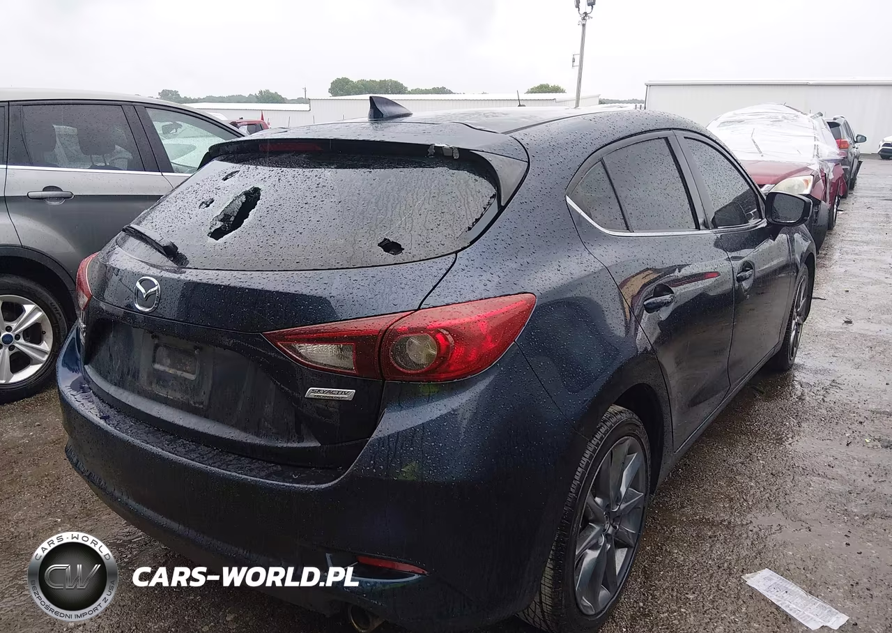 2018 Mazda Mazda3 Touring VIN:3MZBN1L30JM194336 - 4