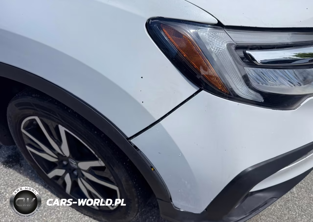 2022 Honda Pilot Touring VIN:5FNYF5H69NB016231 - 6